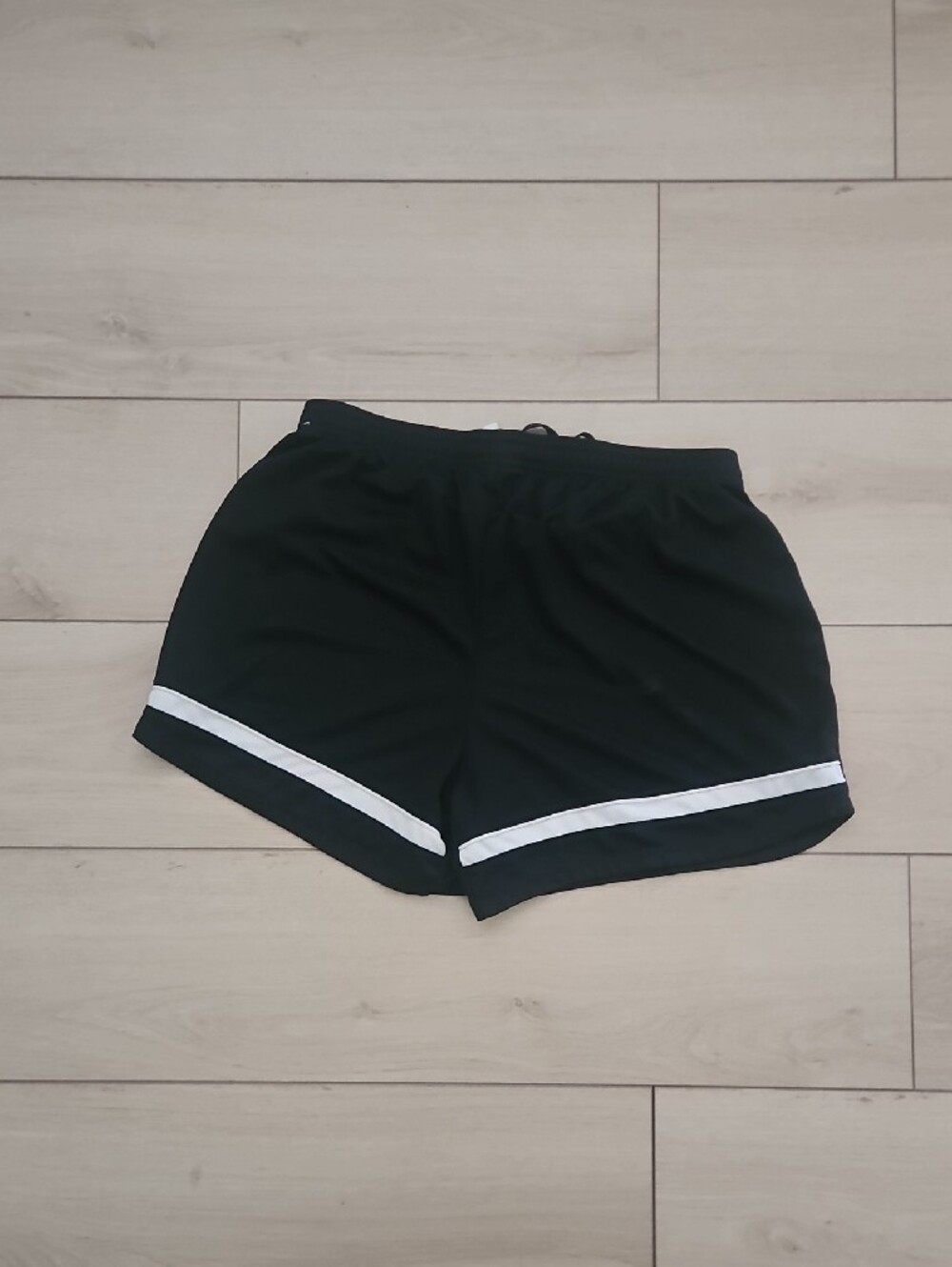 Nike Women's dry fit Black Athletic Shorts with White Swoosh - Picture 2 of 2